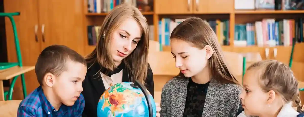 young-woman-teaching-geography-pupil-with-globe
